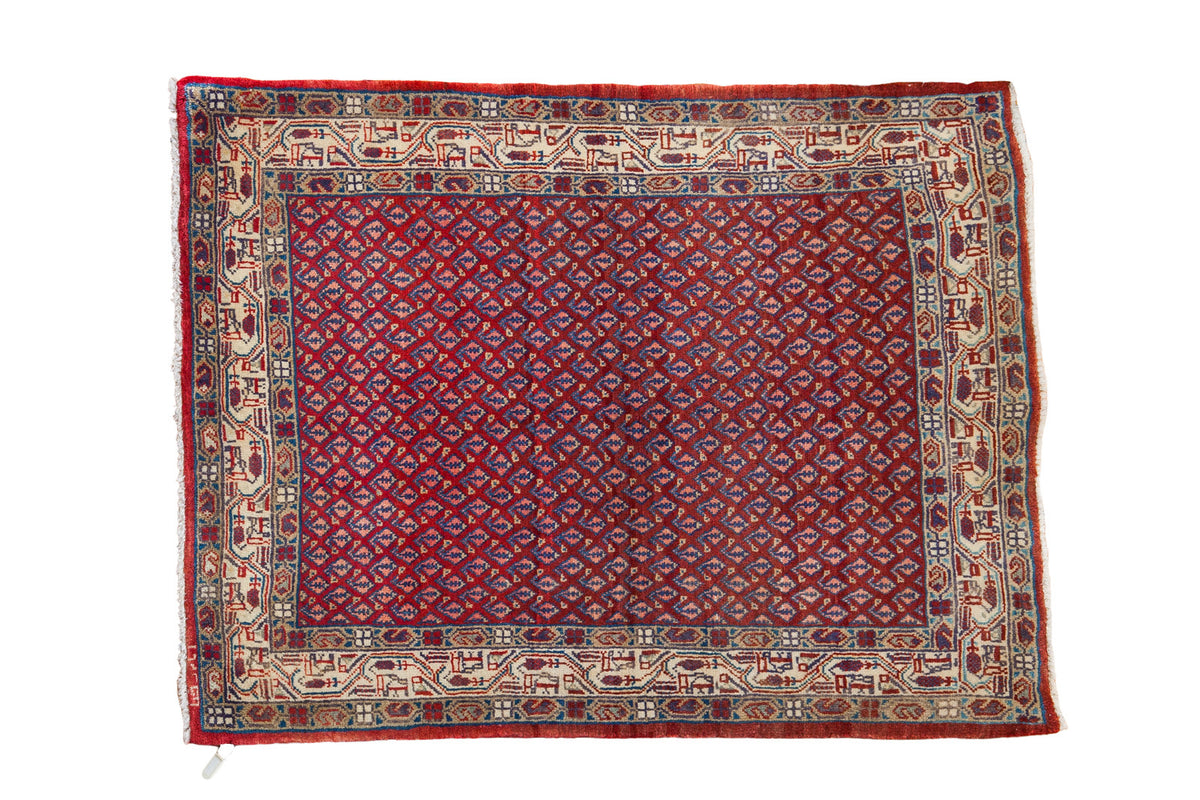 Hand-knotted 1980s Vintage Sarouk rug with brick red allover boteh and ivory Serabend border.