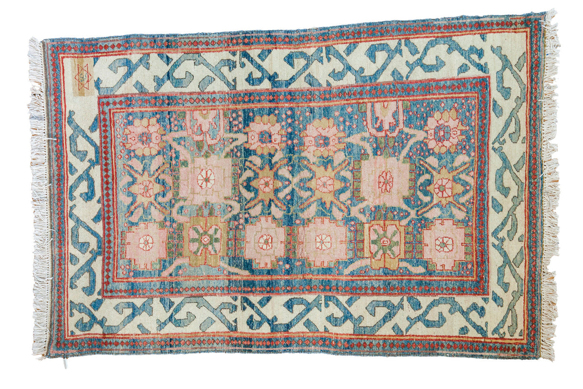 Vintage Indian hand-knotted rug, sky blue field, allover palmette motif, aqua, ivory, red.
