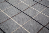 Metal-grey Kilim flatweave texture with argyle lines of ivory, beige, black, brown.