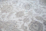 Distressed Sivas carpet pile showing sprawling palmette motifs and exposed foundation.
