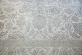 Distressed texture of vintage Sivas carpet, revealing exposed foundation and silver beige palmette motif.