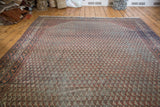 Vintage Mir Serbend hand knotted rug with decorative distressed blue and red allover pattern.