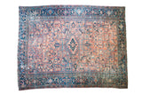 Vintage Heriz hand-knotted carpet with distressed rose and charcoal blue allover compartmentalized geometric design.