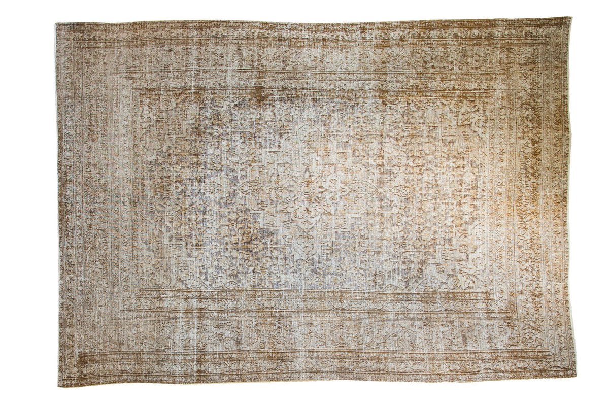 Distressed Khorossan carpet, intricate medallion, allover pattern, bronze, gold, antique ivory, 7'5" x 10'6".