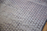 Distressed texture of Oushak runner, highlighting harlequin pattern and subtle dye lot striations.