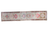 Hand-knotted vintage Oushak runner with bold tribal patterns in subtle rose and beige brown, 2'7