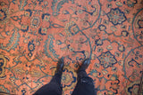 Vintage Persian Mahal carpet detail: rose field, intricate navy palmettes, teal serrated leaves.