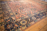 Vintage Mahal carpet border detail: navy palmette design frames rose field with teal leaves.