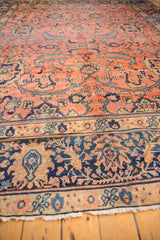 Vintage Mahal carpet with navy, rose, beige border and fine fringe detail.