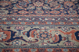 Distressed Tabriz carpet border details with oxidized copper green, rust red, and samovar turtle design.