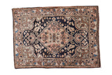 Vintage Sarouk rug, blush scalloped medallion on deep navy, floral design, 2'2