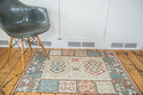 Vintage Turkish Kilim rug, geometric double medallions with alternating color fill and tree designs.