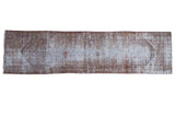 Distressed Malayer runner rug with faded charcoal, moss green, and ivory intricate borders.
