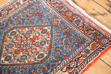 Turtle/samovar border design and barber pole banding with a blue and rust Herati field.