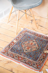 Hand-knotted Bidjar rug corner: sky blue Herati field, zigzag medallion, turtle border.