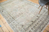 Distressed pile with muted geometric patterns and delicate outlines on this Oushak carpet.