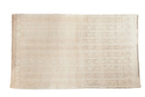 Distressed Turkish Tulu rug with interlatched Moharramat channels in soft celadon, ivory, beige.