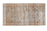 Distressed Sivas carpet, allover faded floral lattice in teal, rust, and gold, 5'5