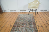 Vintage Malayer runner, distressed herati pattern with emerald green, cinnabar red, and gold hues.