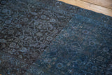 Distressed overdyed runner featuring Herati motif in charcoal, navy, and indigo blues.