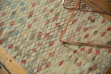 Distressed Oushak runner detail: soft pile, varied color diamond motifs.