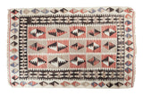 Distressed Turkish Kilim rug, geometric guls in faded red, ivory, and charcoal black, 3x5.