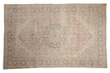 Distressed vintage Oushak carpet, ornate medallion, faded blush, charcoal, ivory floral.