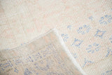 Vintage Distressed Oushak rug pile texture, faded apricot, royal blue patterns, and reverse.