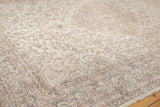 Faded ivory and blush intricate border with soft blue motifs on distressed Oushak pile.