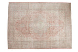 Distressed hand-knotted Oushak carpet, ornate celadon, blush rose, ivory medallion.