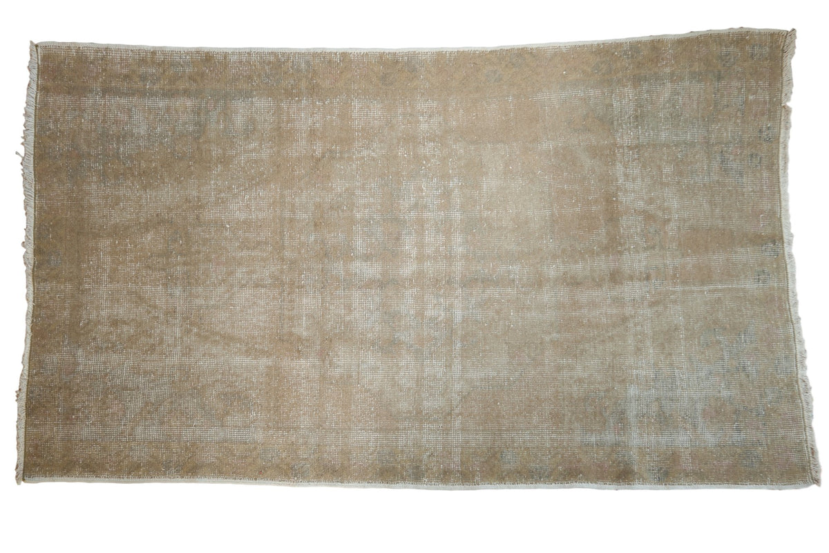 Textured vintage Oushak rug, distressed neutral silver, grey, and white palette, 4'3" x 7'2".