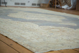 Distressed Oushak texture with softened ivory, light bark brown, and denim blue tones.