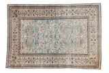 Distressed vintage Oushak rug, slate blue field, blush rose scrolling vine, paneled border.