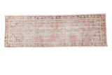 Distressed Oushak runner, faded blush geometric medallions, charcoal grey spandrels. 2'10