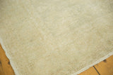 Hand knotted distressed Oushak rug pile in ivory, beige, and silver.