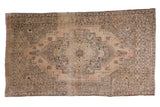 Distressed Oushak carpet with ornate geometric medallion in dusty beige and charcoal, 5'7