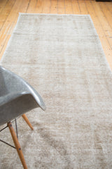 Distressed Oushak runner showcasing faded apricot, beige, light white, and platinum tones.