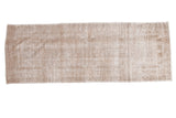Distressed Oushak runner in faded light beige, silver, and apricot tones, 4' x 11'3