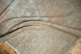 Hand-knotted foundation and textured distressed pile of a vintage Oushak runner.