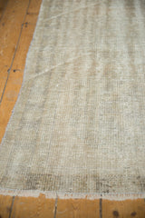 Distressed Oushak runner displaying its finely shorn foundation and unique weave character.