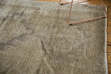 Distressed Oushak runner pile, showcasing soft ivory and coffee bronze hues.