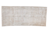 Distressed Oushak runner, silver-grey-white tones, faded medallion, exposed foundation. 2'11