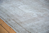 Vintage Turkish Oushak rug showcasing recessed pile and embossed texture in grey.