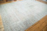 Distressed vintage Oushak carpet with faded Heriz style medallion in blush and silvery grey.