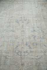 Distressed Oushak carpet with blanched ivory and silver grey Heriz style pattern.