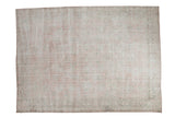 Distressed Oushak carpet with sun-faded rose blush and mint celadon allover palmettes.