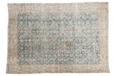 Distressed vintage Turkish Oushak rug, teal blue allover pattern, faded beige border.