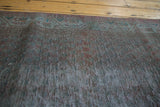 Vintage Sparta Runner's distressed pile showing muted overdyed colors and geometric border.