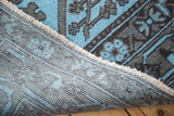 Vintage Overdyed Afghani carpet's hand-knotted back revealing sky blue tribal pile.