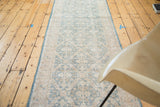 Distressed Sivas runner, displaying sun-faded light green and cream lattice motif.